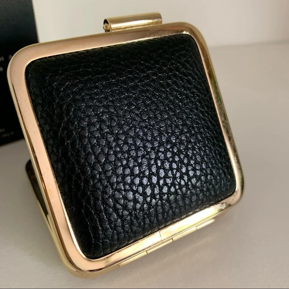 Victoria Beckham leather compact shadow